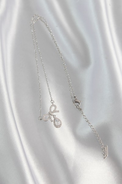 316l çelik Gümüş Renk Zirkon Taşlı Fiyonk Detay Damla Kolye 316l çelik Gümüş Renk Zirkon Taşlı Fiyonk Detay Damla Kolye