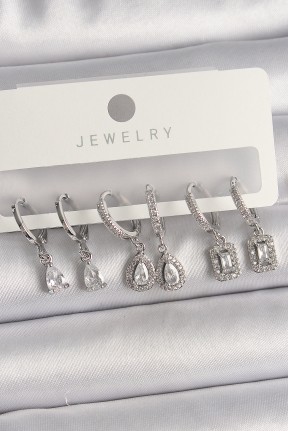 Pirinç Gümüş Renk Sallantı Zirkon Taşlı Damla Model Kadın Küpe Seti Pirinç Gümüş Renk Sallantı Zirkon Taşlı Damla Model Kadın Küpe Seti