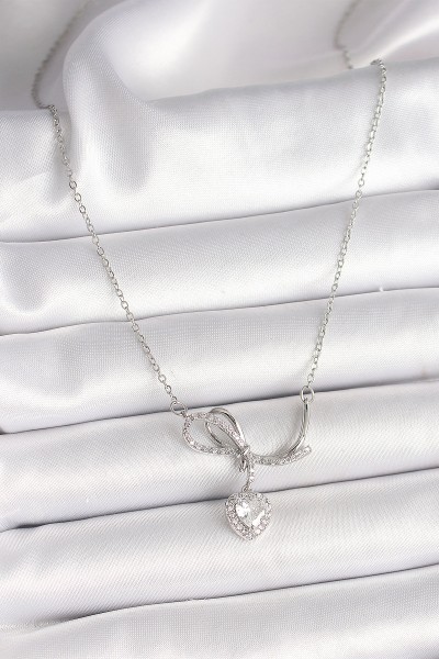 316l çelik Gümüş Renk Zincir Zirkon Taşlı Düğüm Sallantı Kalp Figür Kadın Kolye 316l çelik Gümüş Renk Zincir Zirkon Taşlı Düğüm Sallantı Kalp Figür Kadın Kolye