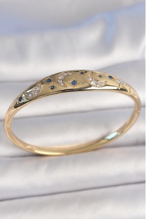 Pirinç Gold Renk Zirkon Taşlı Hilal İşleme Mavi Taşlı Yıldız Detay Kadın Kelepçe Pirinç Gold Renk Zirkon Taşlı Hilal İşleme Mavi Taşlı Yıldız Detay Kadın Kelepçe