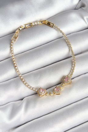 Pirinç Sıralı Pembe Kalp Figürlü Zirkon Taşlı Gold Renk Kadın Bileklik Pirinç Sıralı Pembe Kalp Figürlü Zirkon Taşlı Gold Renk Kadın Bileklik