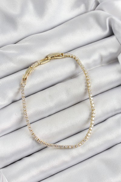 Pirinç Zirkon Taşlı İnce Su Yolu Model Gold Renk Kadın Bileklik Pirinç Zirkon Taşlı İnce Su Yolu Model Gold Renk Kadın Bileklik