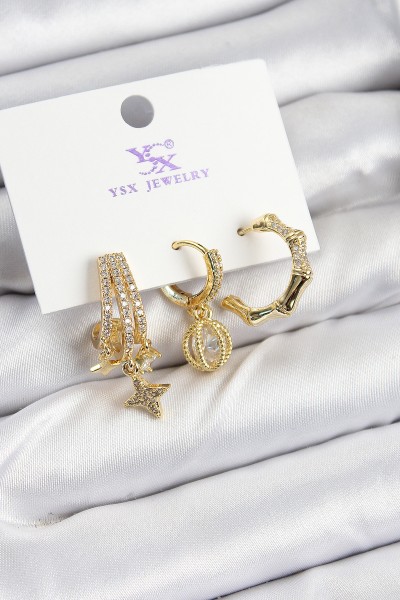Pirinç Zi̇rkon Taşlı Sallantılı Yıldız Model Gold Renk 3'lü Kadın Küpe Pirinç Zi̇rkon Taşlı Sallantılı Yıldız Model Gold Renk 3'lü Kadın Küpe