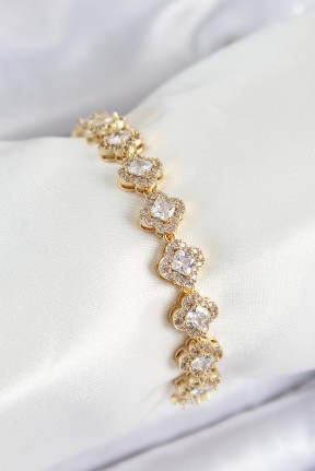 Pirinç Zirkon Taşlı Yonca Baget Model Gold Renk Vip Seri Kadın Bileklik Pirinç Zirkon Taşlı Yonca Baget Model Gold Renk Vip Seri Kadın Bileklik