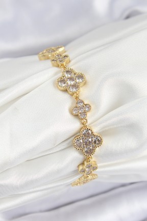 Pirinç Zirkon Taşlı Yonca Model Gold Renk Vip Seri Kadın Bileklik Pirinç Zirkon Taşlı Yonca Model Gold Renk Vip Seri Kadın Bileklik