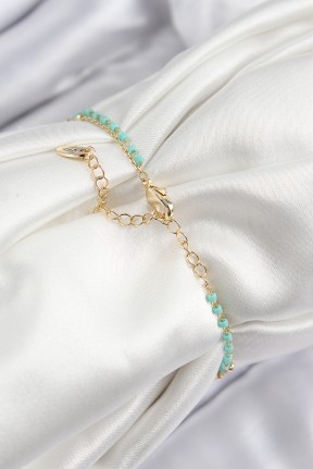 Pirinç Zirkon Taşlı Mavi Boncuklu Model Gold Renk Kadın Bileklik Pirinç Zirkon Taşlı Mavi Boncuklu Model Gold Renk Kadın Bileklik