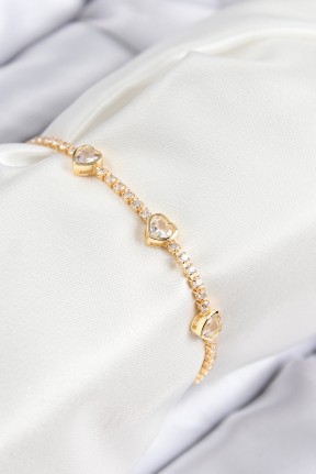Pirinç Zirkon Taşlı Sıralı Kalp Model Gold Renk Kadın Bileklik Pirinç Zirkon Taşlı Sıralı Kalp Model Gold Renk Kadın Bileklik