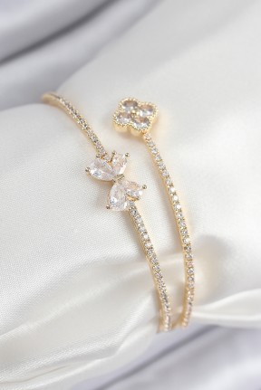 Pirinç Zirkon Taşlı Fiyonk Ve Yonca Model Gold Renk Kadın Bileklik Pirinç Zirkon Taşlı Fiyonk Ve Yonca Model Gold Renk Kadın Bileklik