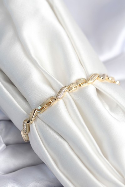 Pirinç Gold Renk Zirkon Taşlı Sarmal Model Kadın Bileklik Pirinç Gold Renk Zirkon Taşlı Sarmal Model Kadın Bileklik