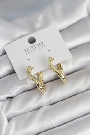 Gold Renk Eğik Halka Model Pirinç Kadın Küpe Gold Renk Eğik Halka Model Pirinç Kadın Küpe