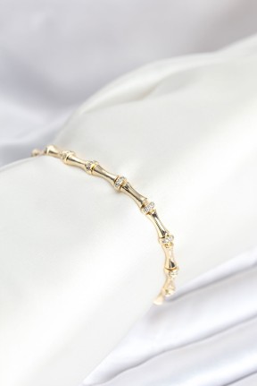 Pirinç Gold Renk Kemik Model Zirkon Taşlı Kadın Bileklik Pirinç Gold Renk Kemik Model Zirkon Taşlı Kadın Bileklik