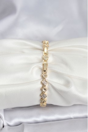 Pirinç Gold Renk Vip Seri Sıralı Yonca Model Zirkon Taşlı Kadın Bileklik