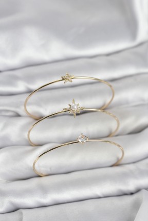 Gold Renk Kutup Yıldızı Model Zirkon Taşlı 3'lü Kadın Bileklik Kombini Gold Renk Kutup Yıldızı Model Zirkon Taşlı 3'lü Kadın Bileklik Kombini